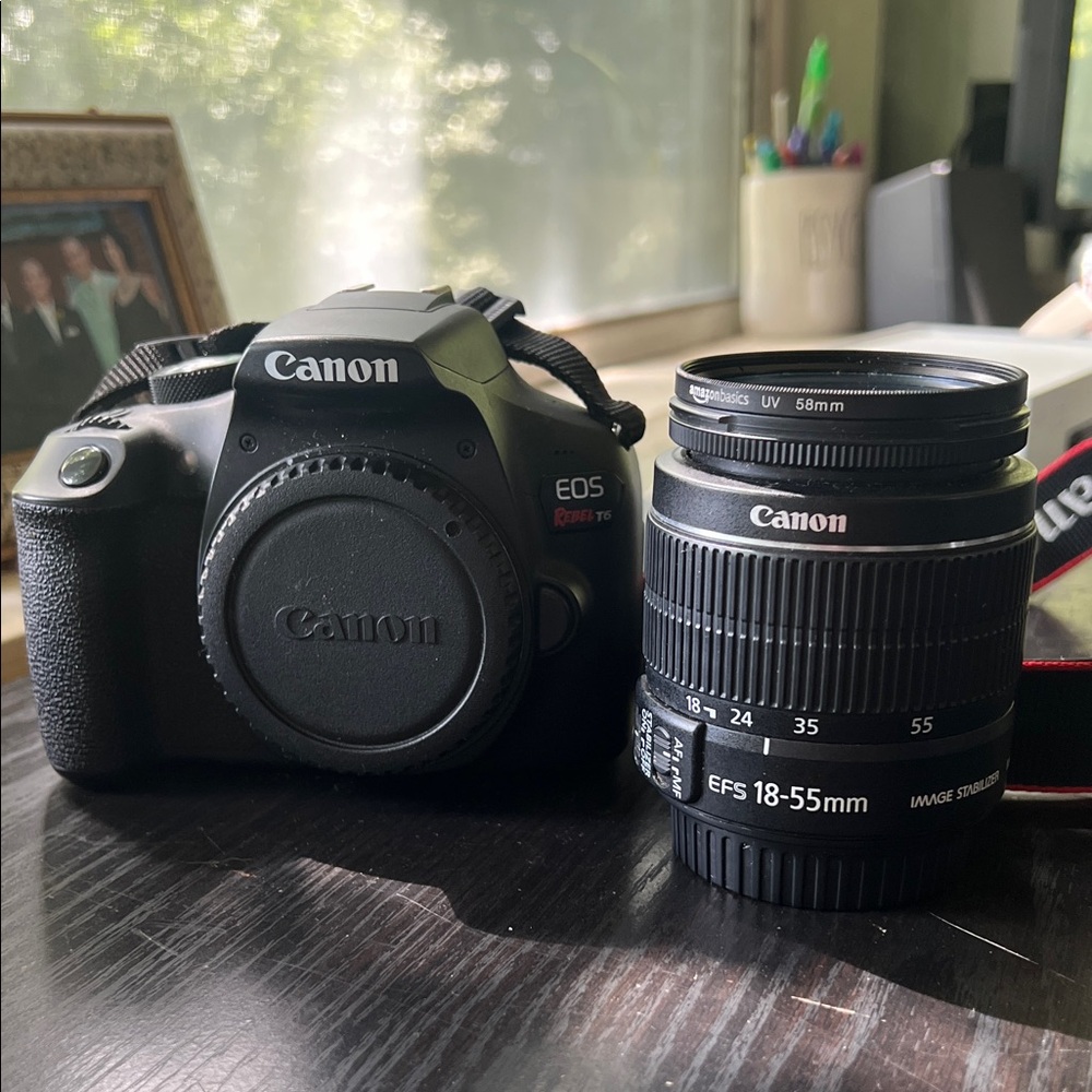 Canon Black EOS Rebel DSLR with Lens